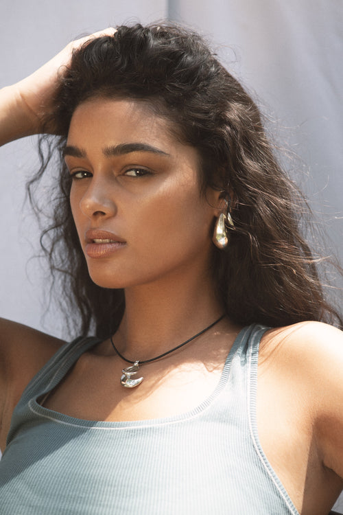 silver sculptural hoop earrings