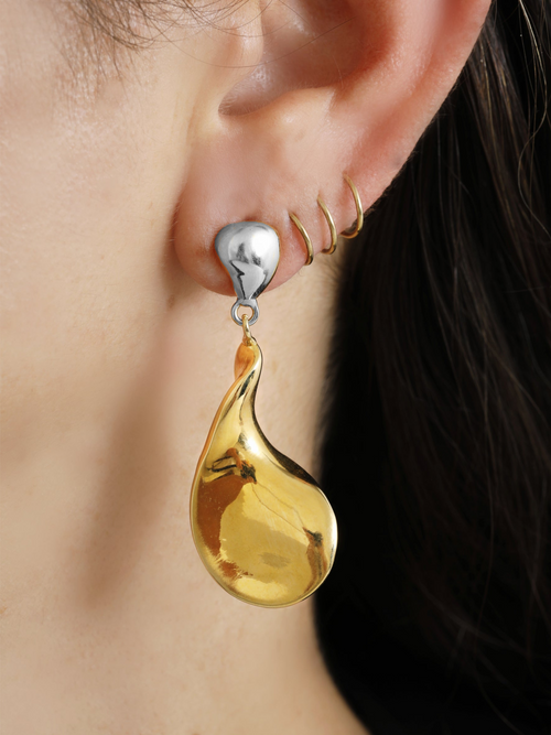 silver and gold sculptural earring