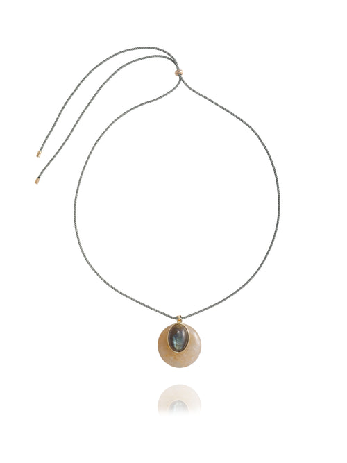 MOUNSER Aarnio Pendant in Olive Oil, featuring a layered yellow jade disc with labradorite cabochon and 14k gold-plated brass accents, suspended from an adjustable moss green twisted silk cord, on white background.