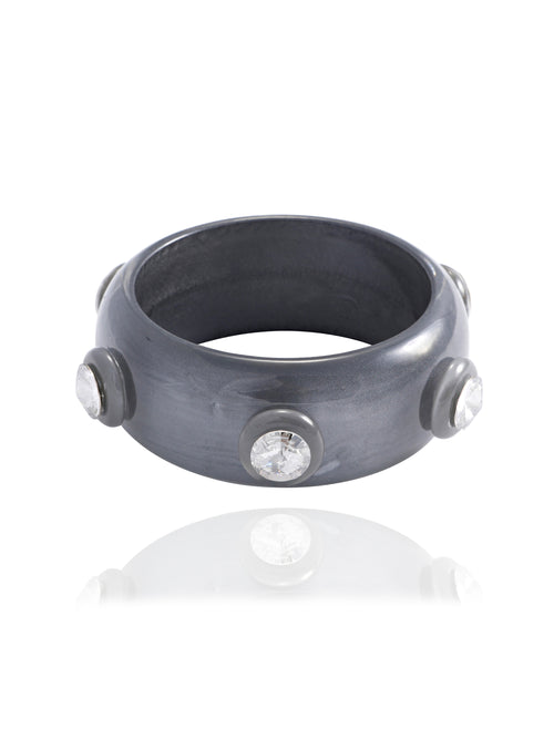 MOUNSER Ambrosia Bangle in Black Sesame featuring a glossy resin silhouette with round Austrian crystal accents.