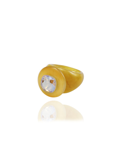 angle shot of MOUNSER Bliss Ring in Honey with domed acrylic band and Swarovski crystal gemstone.  