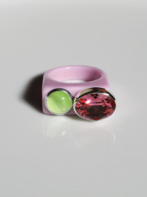 contrast shot of MOUNSER Couplet Ring in Rose Water a jewel toned dual stone ring featuring a Swarovski rhinestone and natural gemstone cabochon on a lucite band.