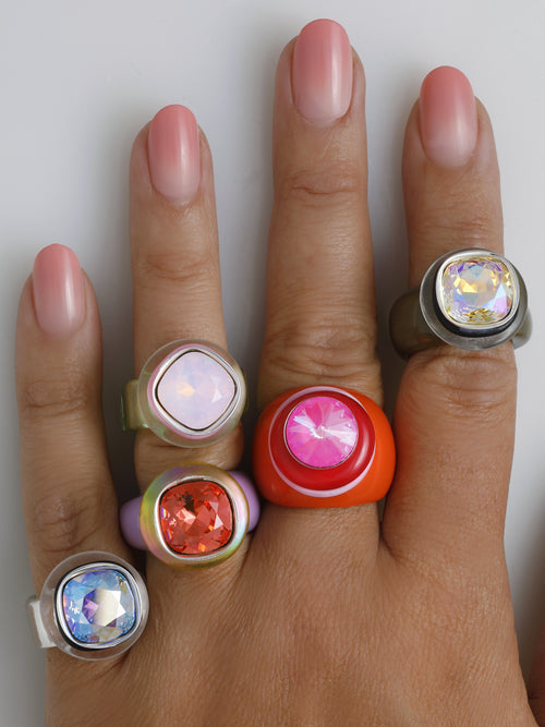 Model wearing MOUNSER Daydream Ring in Disco and colorful acrylic resin ring collection