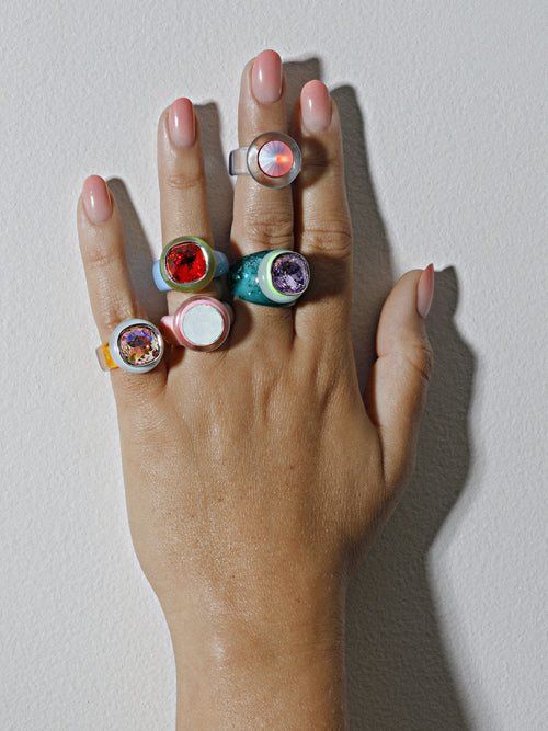 Close-up of MOUNSER Daydream Ring in Tulum showing vibrant Swarovski crystal and polished acrylic ring band