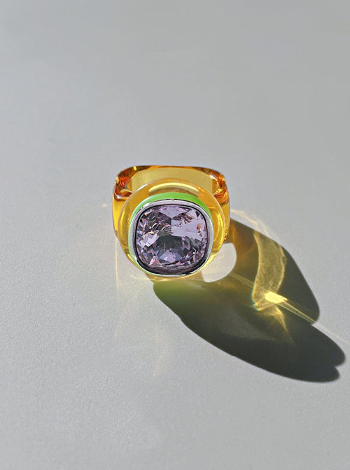 Contrast shot of MOUNSER Daydream Ring in Vista showing sculptural acrylic resin ring base and Swarovski crystal detail