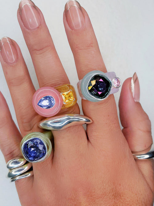 detail shot of MOUNSER Good Mood Ring in Auroa, a colorful sculptural cocktail ring featuring a Swarovski crystal rhinestone element 