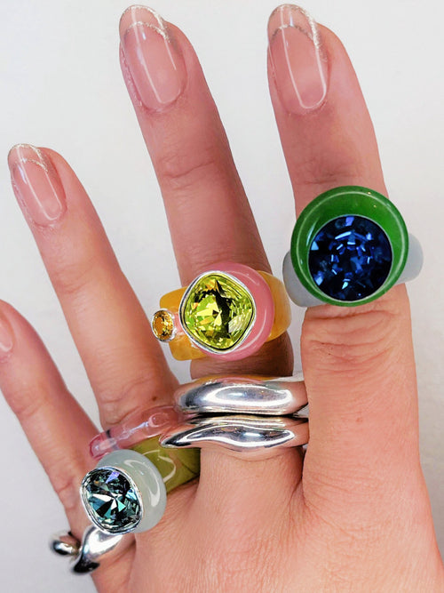 detail shot of MOUNSER Good Mood Ring in Limeade, a colorful sculptural cocktail ring featuring a Swarovski crystal rhinestone element 