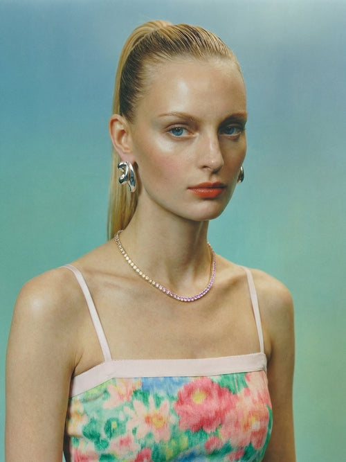 MOUNSER Laguna Necklace in Sunset pink designer tennis necklace model shot