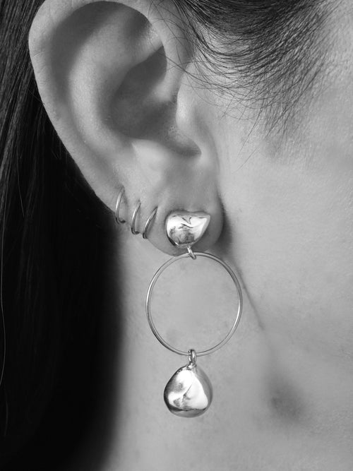 MOUNSER Lunar Earrings in Silver sculptural hoop earring