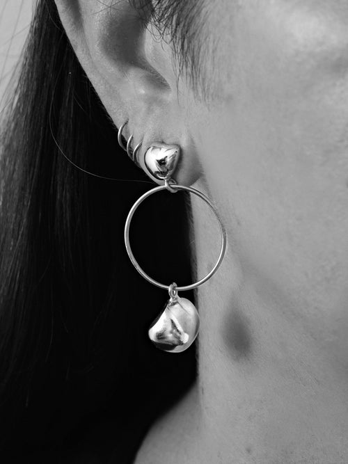 MOUNSER Lunar Earrings in Silver sculptural hoop earring
