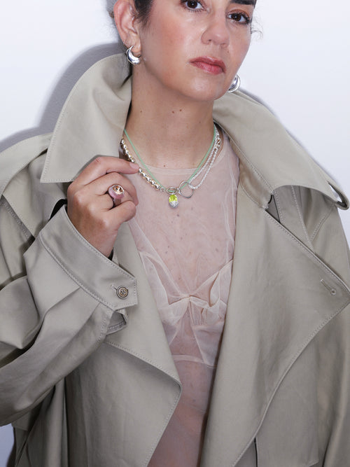 MOUNSER Nest Necklace in Wasabi sculptural designer cord pendant necklace on model