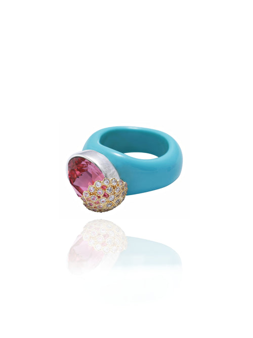 angle shot of MOUNSER Nest Ring in 1986 featuring a brilliant Swarovski crystal, pavé rhinestone detailing and colorful acrylic resin ring band.