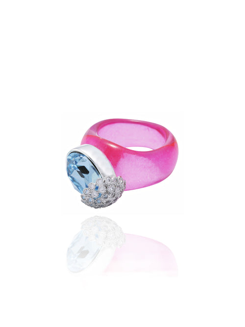 angle shot of MOUNSER Nest Ring in Bikini featuring a brilliant Swarovski crystal, pavé rhinestone detailing and colorful acrylic resin ring band.