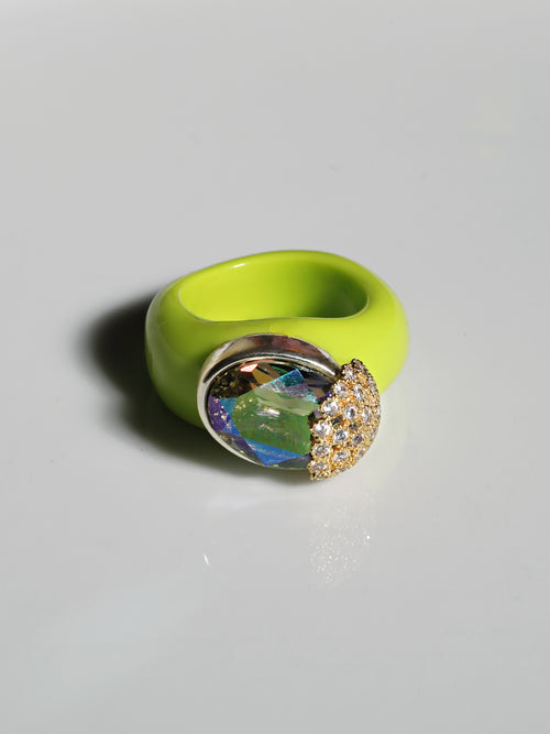 contrast shot of MOUNSER Nest Ring in Key Lime featuring a brilliant Swarovski crystal, pavé rhinestone detailing and colorful acrylic resin ring band.