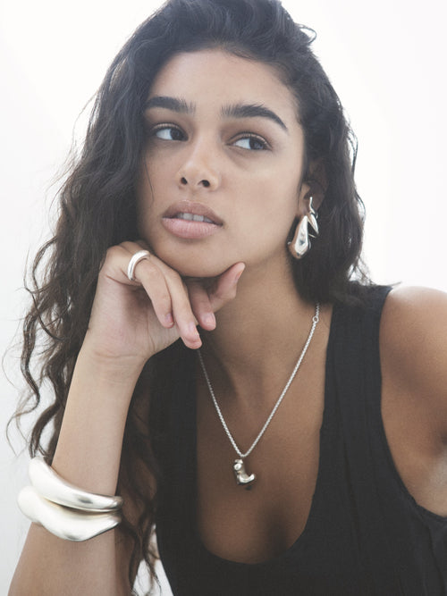 close up shot of MOUNSER Oak Cuff Bracelet in Sterling Silver sculptural statement cuff bracelet with a puffed voluminous shape and matte  finish