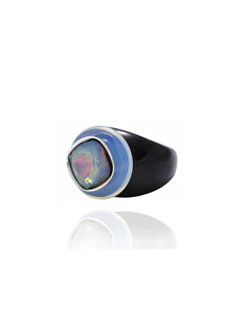 angle shot of MOUNSER Objects Found Ring in Rothko featuring glossy, polished natural gemstone, and Swarovski crystal on an acrylic ring base