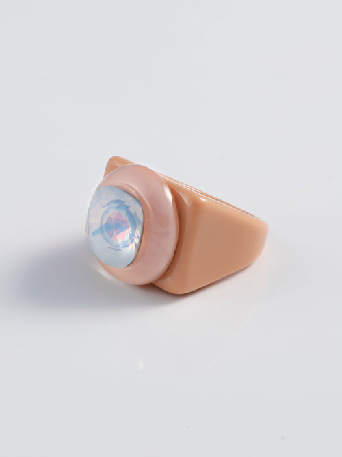 Side view shot of MOUNSER Raw Gradient Block Ring in Baby Tee featuring a colorful Swarovski crystal on an acrylic resin band