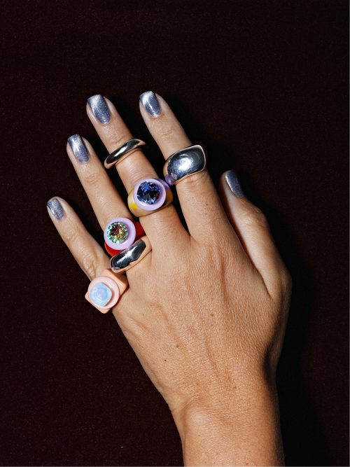 Detail shot of MOUNSER Raw Gradient Block Ring in Baby Tee featuring a colorful Swarovski crystal on an acrylic resin band