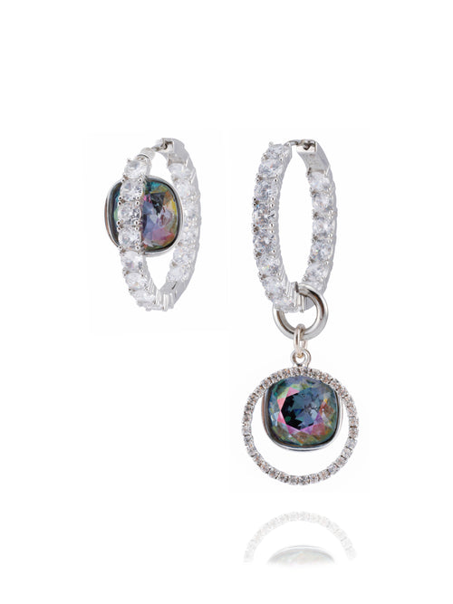 MOUNSER Refraction Hoop Earrings / Crystalline crystal cubic zirconia–encrusted inside-out hoops in sterling silver featuring iridescent, large cushion-cut Austrian crystal charms positioned asymmetrically.
