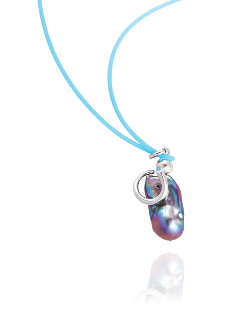 Close up detail shot of MOUNSER Seaside Souvenir Necklace in Aegean showing sculptural freshwater pearl pendant cord necklace