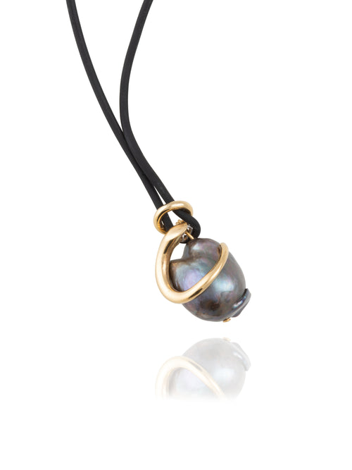 Close up detail shot of MOUNSER Seaside Souvenir Necklace in Hydra showing sculptural freshwater pearl pendant cord necklace