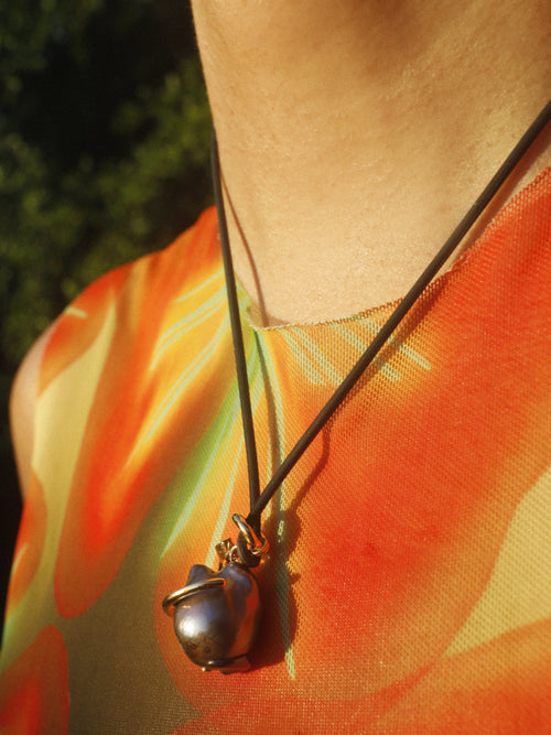 Close detail of MOUNSER Seaside Souvenir Necklace in Hydra showing sculptural freshwater pearl pendant