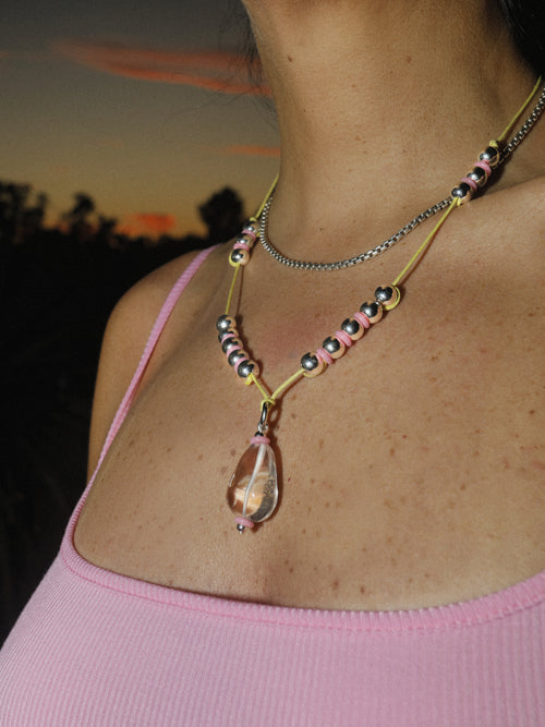 detail shot of MOUNSER Seaside Souvenir Necklace in Ibiza colorful glass beaded cord choker necklace 