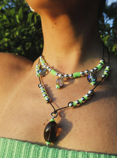close up shot of MOUNSER Seaside Souvenir Necklace in Menorca colorful glass beaded cord choker necklace 