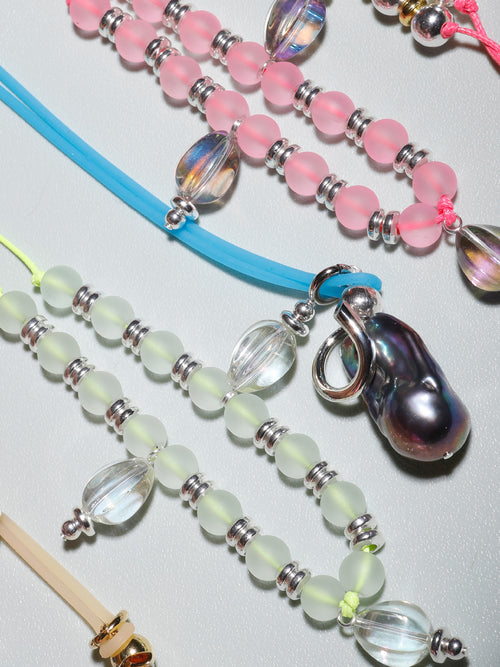 collection shot of MOUNSER Seaside Souvenir Necklace in Positano colorful glass beaded cord choker necklace 