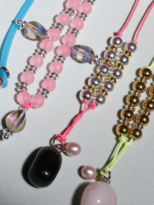 collection shot of MOUNSER Seaside Souvenir Necklace in Sardinia colorful glass beaded cord choker necklace 