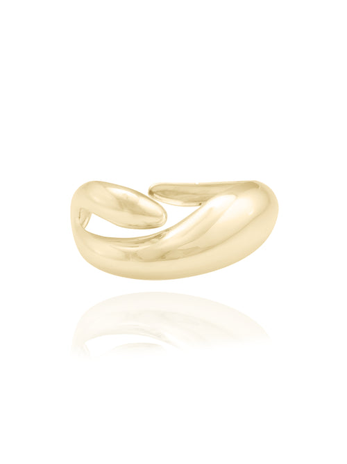 angle shot of MOUNSER Small Buck Cuff Bracelet in Sterling Silver and Gold Vermeil free form organic shaped statement cuff with mirror finish