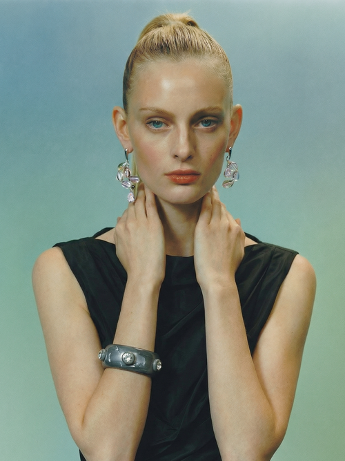 model shot of MOUNSER Soap Earrings in Astral Purple sculptural glass asymmetric statement earrings.