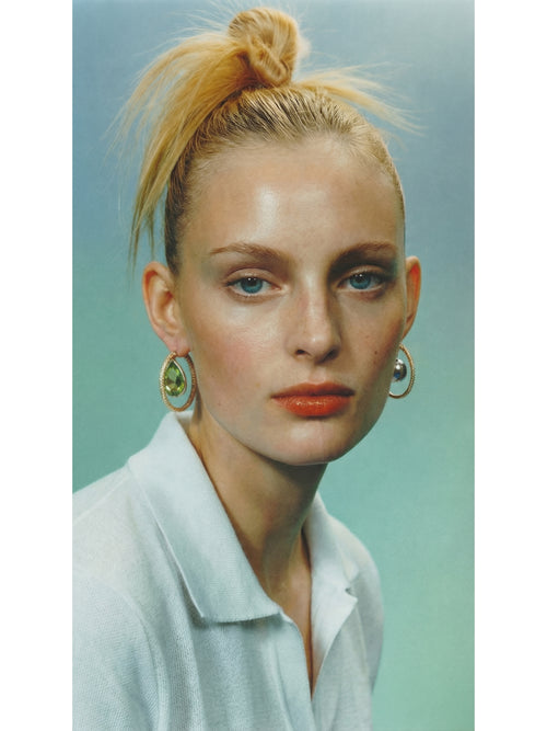 model shot of MOUNSER Viburnum Hoop Earrings pavé hoop earrings with asymmetric floating crystal and orb drops.