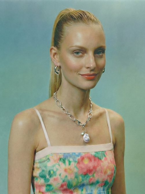 model shot of MOUNSER Waxing Necklace in Silver chunky chain link with baroque pearl charm