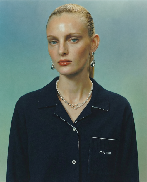 studio shot of MOUNSER XO Chain Necklace in Sterling Silver asymmetric chain necklace that balances delicate wheat chain and silver ball bead chain through trompe l'oeil design