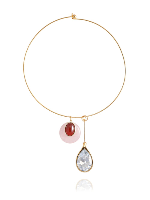 MOUNSER Rega Collar Necklace in Amarena, featuring a minimal 14k gold-plated brass collar with suspended pink and red carnelian domed pendant and elongated clear Austrian crystal teardrop pendant, on white background.