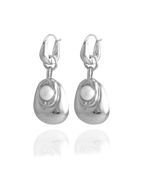Side profile of MOUNSER Tide Pool Earrings showing the sculptural freeform puffed drop and freshwater pearl set on a sterling silver huggie hoop