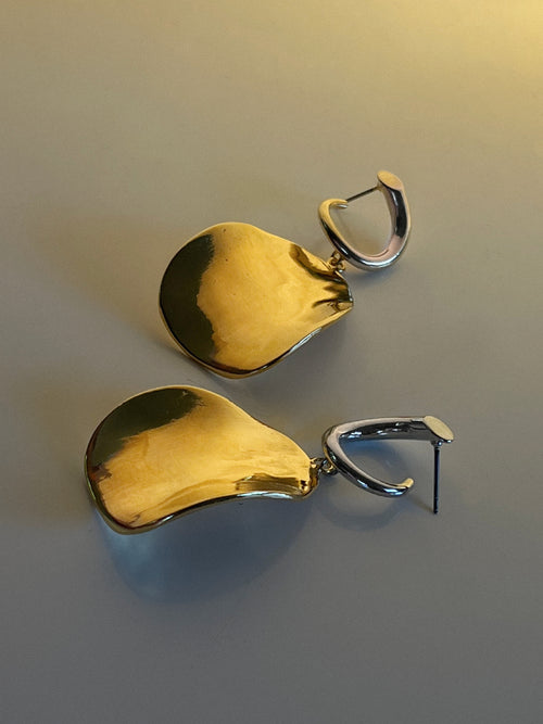 silver and gold sculptural earring