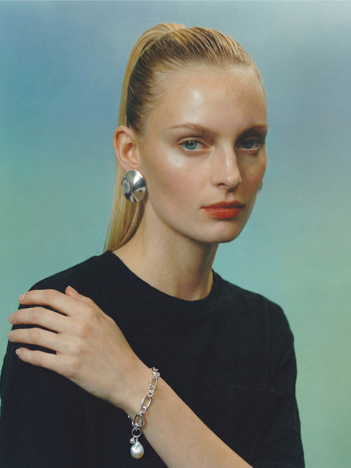 Mounser silver sculptural disc earrings 