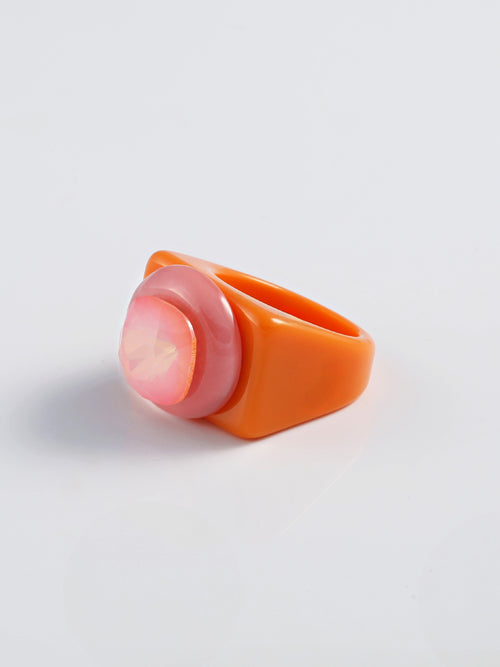 Artful dimensional ring with polished acrylic band and luminous crystal