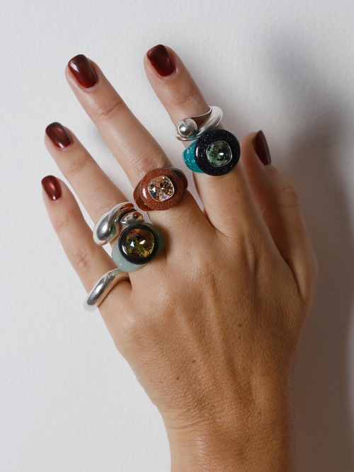 Hand wearing the MOUNSER Bliss Ring in Wintergreen on the finger, showing the domed cocktail ring’s size and scale.
