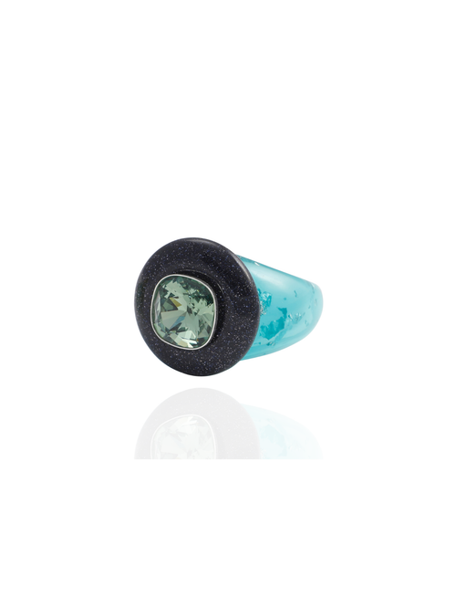 Side profile of the MOUNSER Bliss Ring in Wintergreen showing its domed shape and teal glitter resin band with blue goldstone accent.