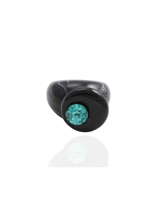 MOUNSER Orbital Ring in Charcoal, front view: natural black agate disc with a green crystal on a black resin band.