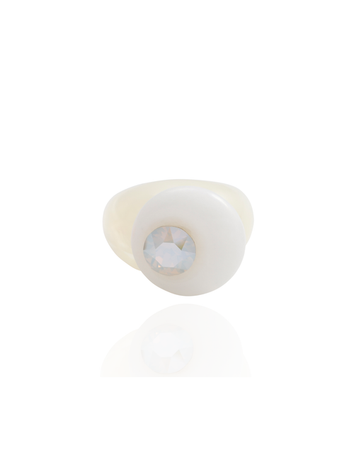 MOUNSER Orbital Ring in Griege, front view: white jade disc with an iridescent crystal on a white resin band.