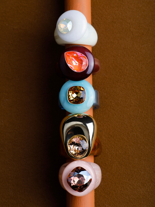MOUNSER Orbital Ring in Griege, a celestial white jade gemstone statement ring in a still life, handcrafted in LA.