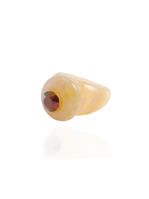 Side profile of the MOUNSER Orbital Ring in Silica showing the yellow jade gemstone disc and milky marbled resin band.