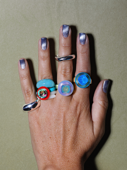 Studio shot of MOUNSER Raw Gradient Cellophane Ring in Crystalline Veil featuring a Swarovski crystal and acrylic resin band