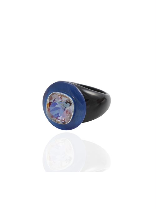 Side profile of the MOUNSER Ring Pop in Elderberry showing its sculptural shape and opaque blue and black acrylic resin band.