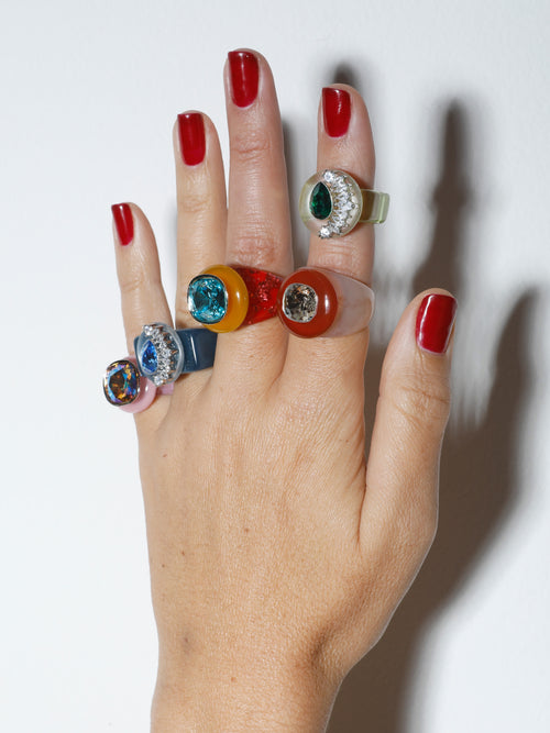 On hand shot of MOUNSER Ring Pop in Ikebana colorful sculptural cocktail ring