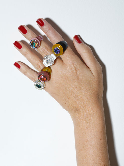 On hand studio shot of MOUNSER Ring Pop in Shaved Ice white sculptural cocktail ring